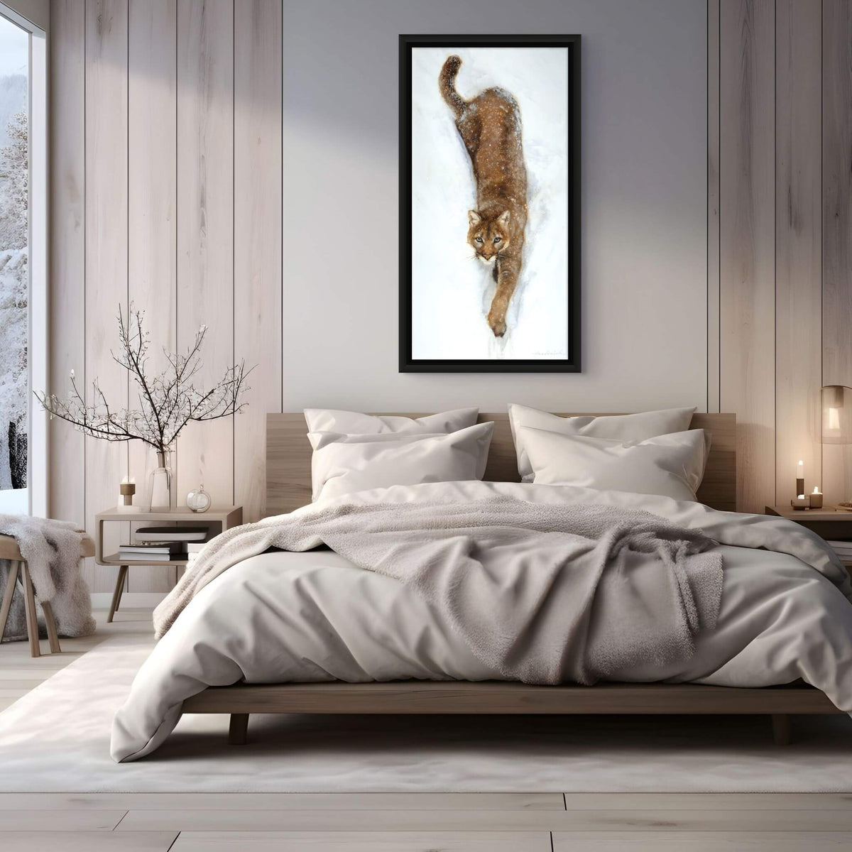 A vertical art print featuring a painted cougar or mountain lion walking through deep snow, centered on a white border against a light gray background.